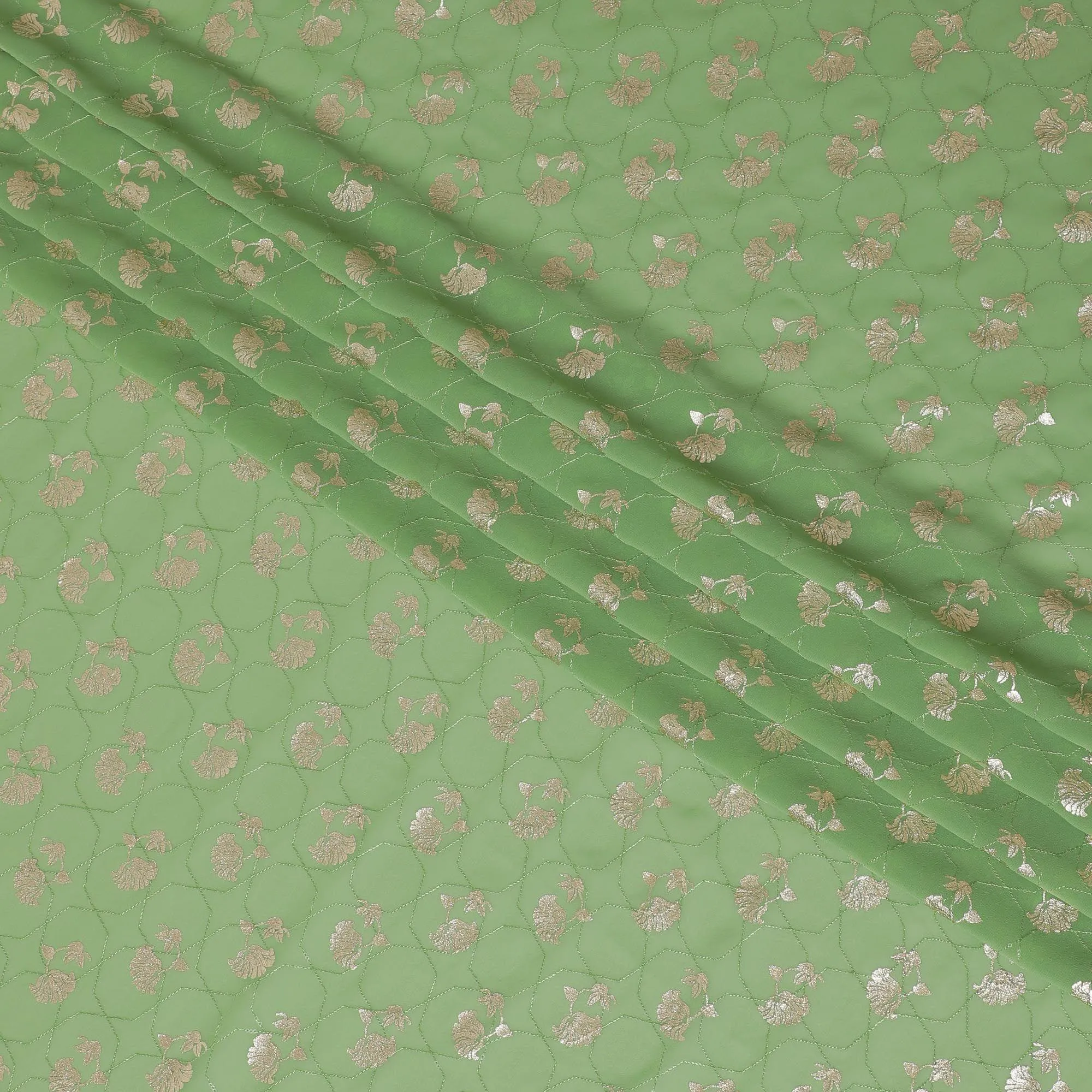 Sage green synthetic georgette fabric with same tone embroidery having gold foil print in floral design-D12030