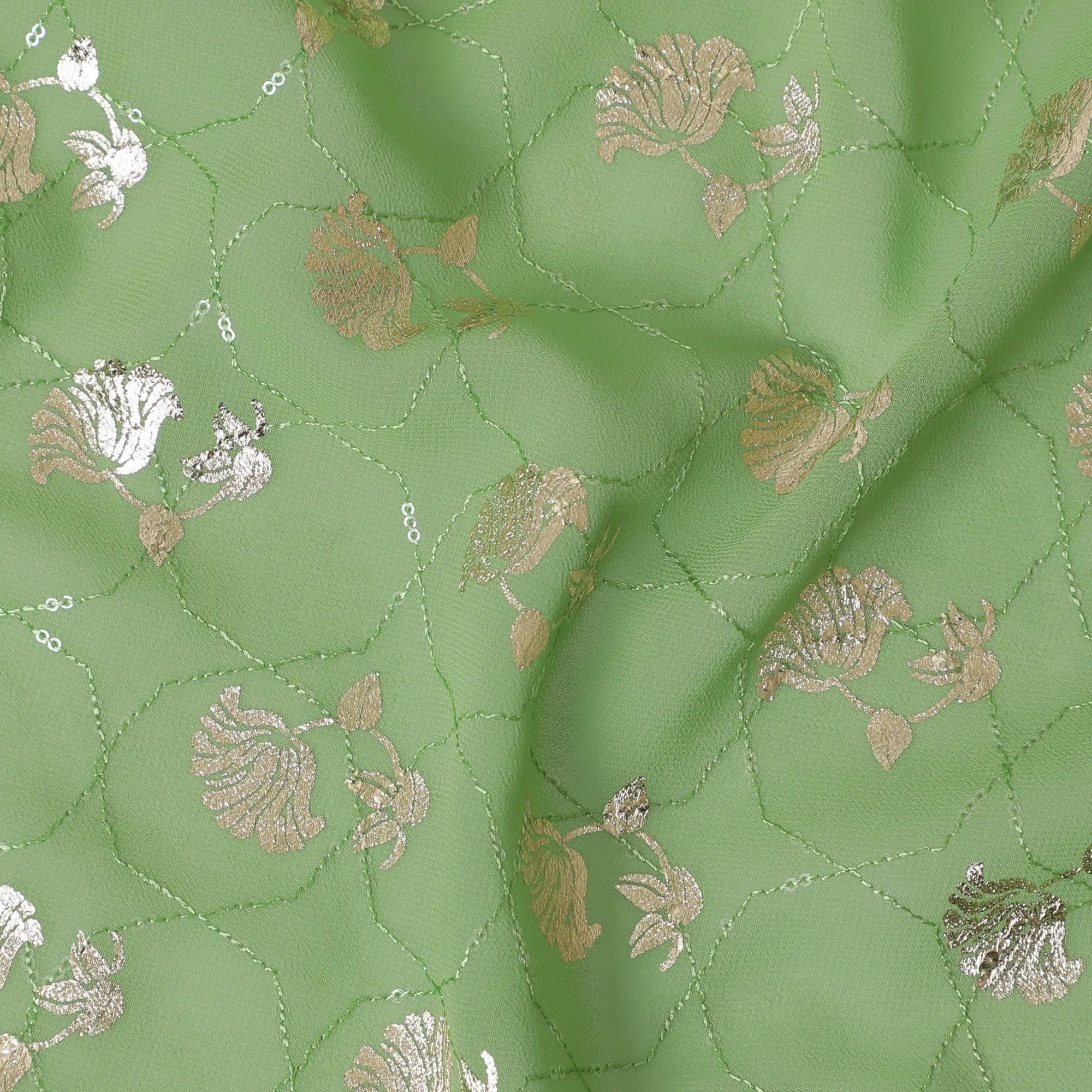 Sage green synthetic georgette fabric with same tone embroidery having gold foil print in floral design-D12030