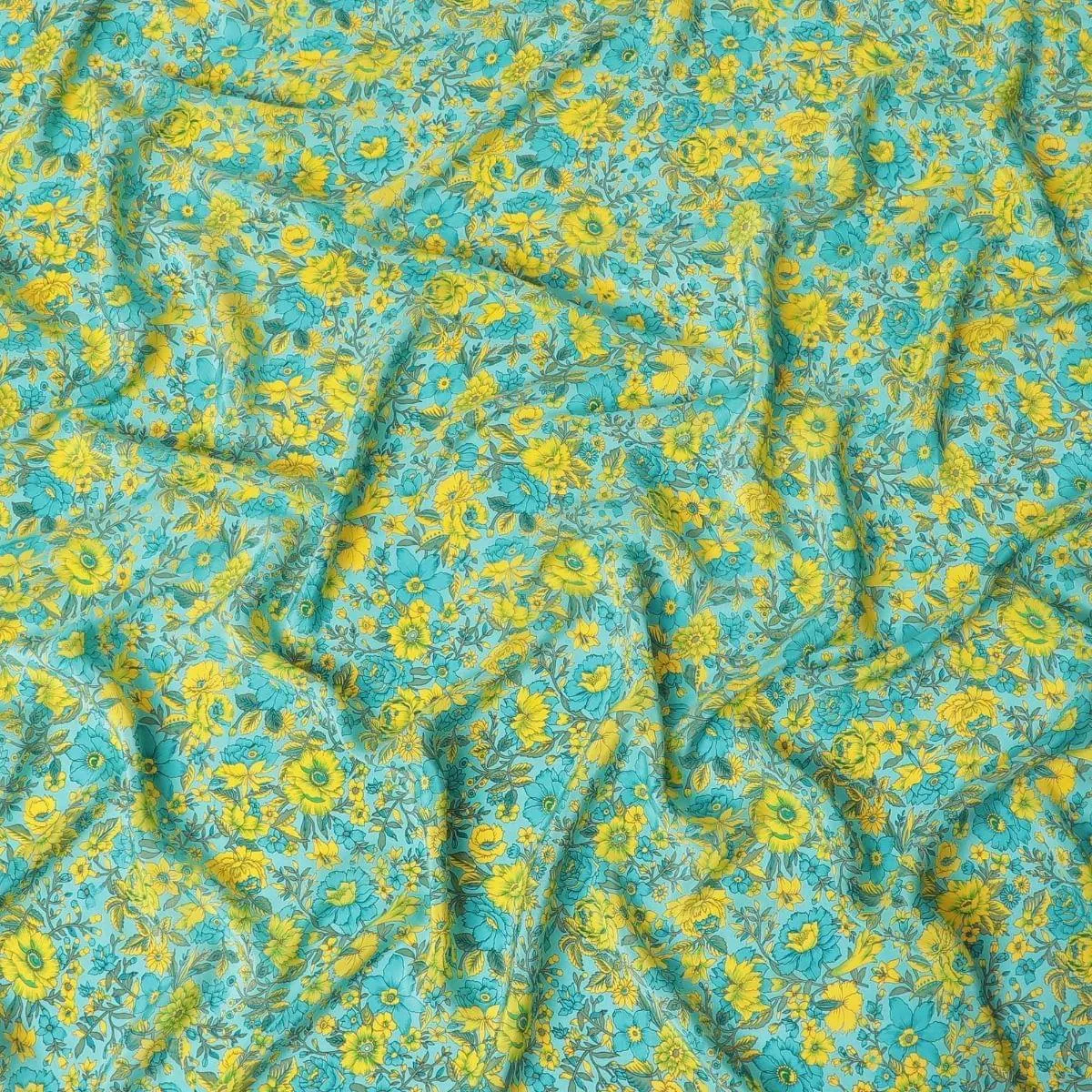 Turquoise blue silk crepe fabric with yellow, green and blye prints in floral design - D9911